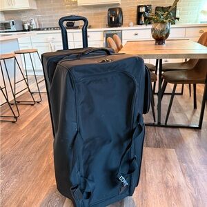 TUMI Alpha Large Wheeled Duffel 28–30” Rolling Luggage Black Checked Bag